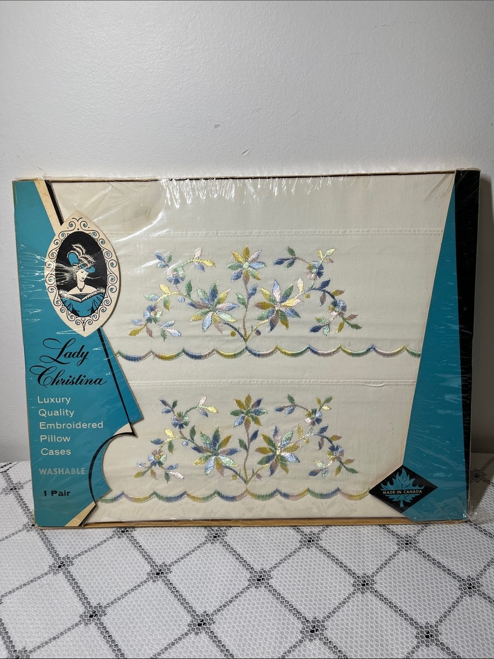 Christina Embroidered Floral Pillowcases in Cream with Pastel Accents
New
